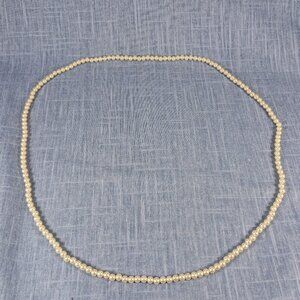1970s Vintage Necklace: Single Continuous String of White Pearl Beads
